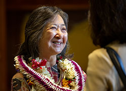 Photo of a woman smiling. Link to Life Stage Gift Planner Over Age 65 Situations.